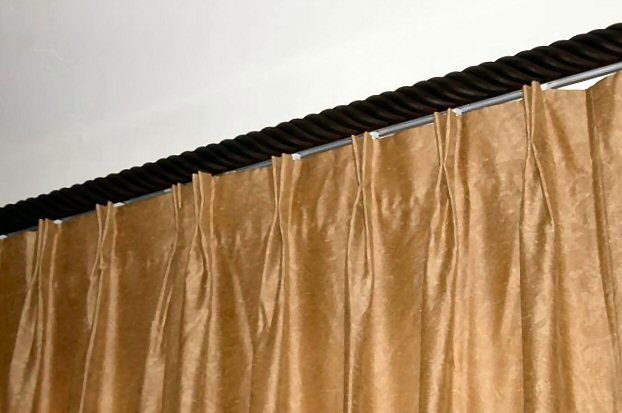 sandy drapes, seat cushions, striped, tan trending pillows and fabrics. vignettes close up view, bright pillows